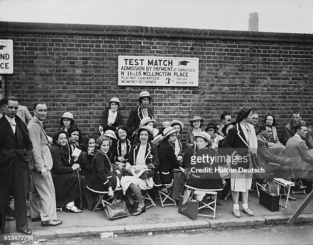 Hampstead schoolgirls queue for entry to the second day's play in the second Test cricket match between England and Australia, at London's Lord's...