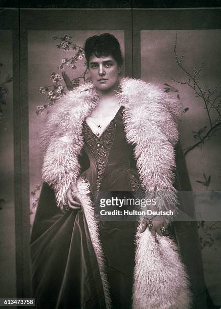 Lady Jennie Churchill in a long fur-lined cloak, 1888.