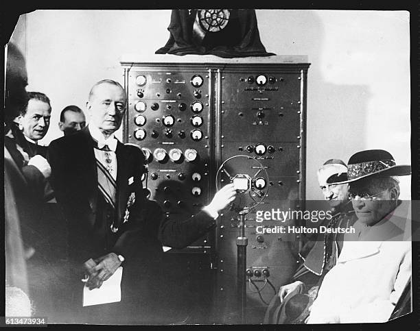 Pope Pius XI listens to a speech made by the Italian inventor Guglielmo Marconi using his transmitting set. | Location: The Vatican, Rome, Italy.