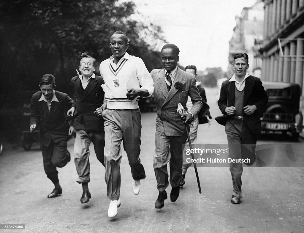 Jesse Owens Runs With Fans