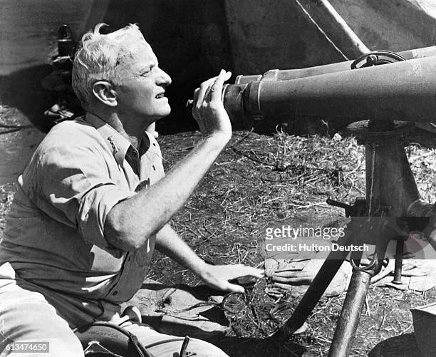 Admiral Chester William Nimitz, commander of the US Pacific Fleet, observes Japanese positions on Guadalcanal Island.