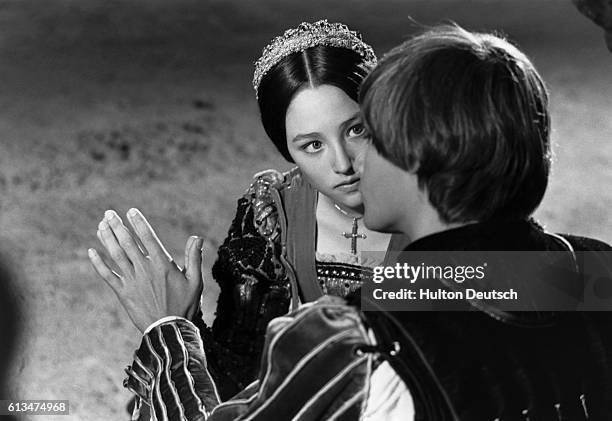 Actress Olivia Hussey and actor Leonard Whiting filming Romeo and Juliet, 1967.