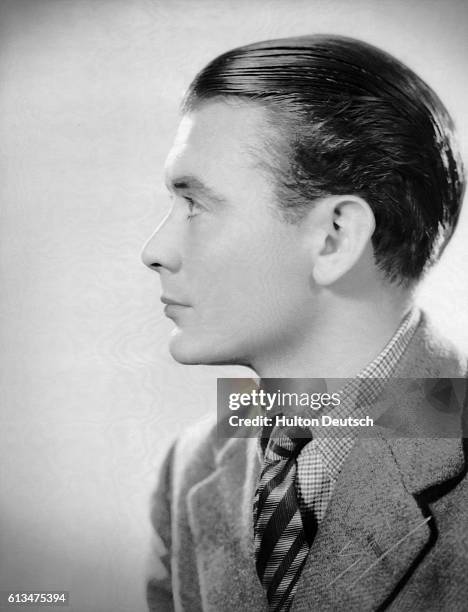 British stage and film actor John Mills photographed by Sasha, 1934. Sasha is known for his portraits of celebrities from the world of art, theatre,...