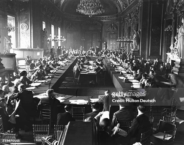 Members of the international Committee of Procedure of the Paris Conference, in session at the Luxembourg Palace. The committee is chaired by...