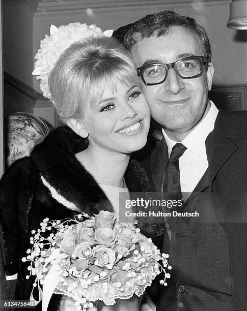 English comic actor Peter Sellers marrying Swedish actress Britt Ekland at Guildford Register Office, England, 1964.