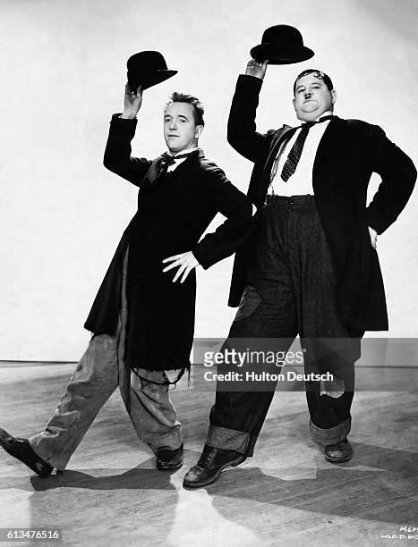 American comedy duo Oliver Hardy , real name Oliver Norvelle Hardy , and Stanley Laurel , real name Arthur Stanley Jefferson. Ca. 1927.