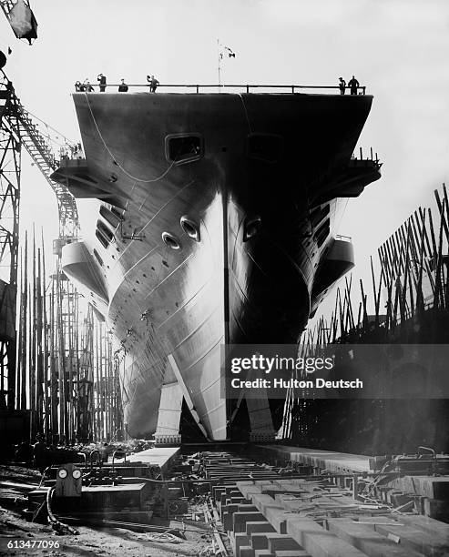 New aircraft carrier launched. HMS Illustrious, the largest aircraft carrier yet built for the Royal Navy, was launched today from the yard of...