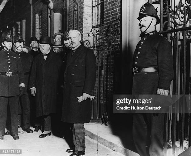 Ramsay Macdonald, Britains first Labour Prime Minister, leaves Downing Street for Buckingham Palace to tender his resignation to King George V.