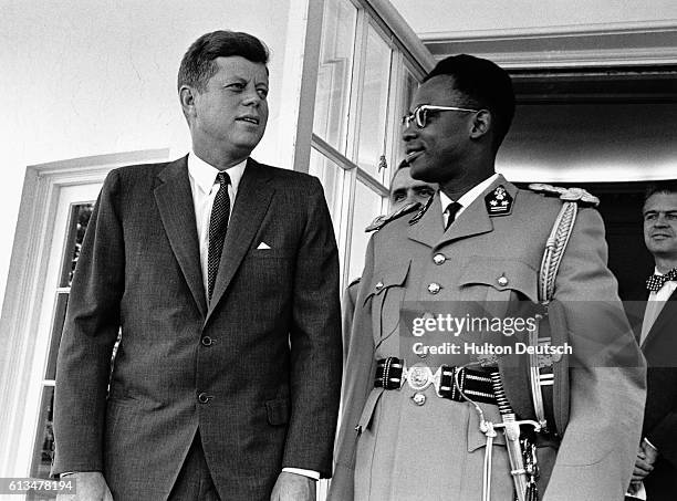 Major General Joseph Mobutu, the Commander in Chief of the Congolese armed forces with the American President John F. Kennedy during a 1963 visit to...