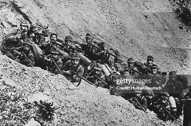 Italian troops man a trench in the mountains, Trentino, 1915. | Location: Trentino, Italy.
