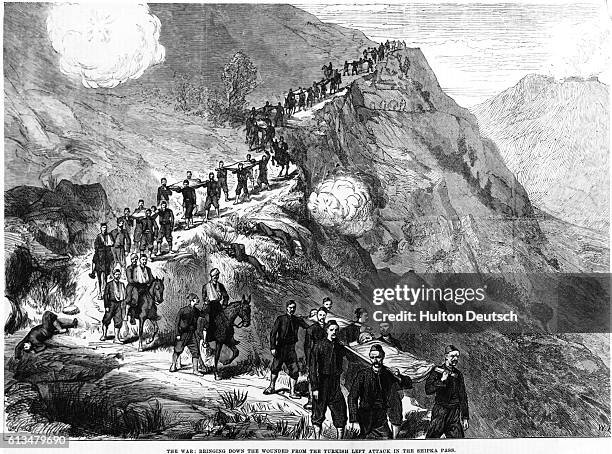Wounded men move down through the Shipka Pass in the Balkan mountains during the Russo-Turkish War . September 1877, Bulgaria.