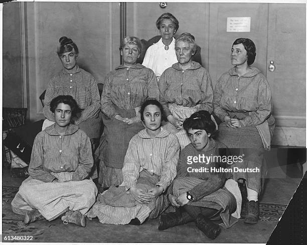 Eight suffragettes who served terms in the Washington workhouse for picketing the White House. They attended a meeting of the National Women's Party...