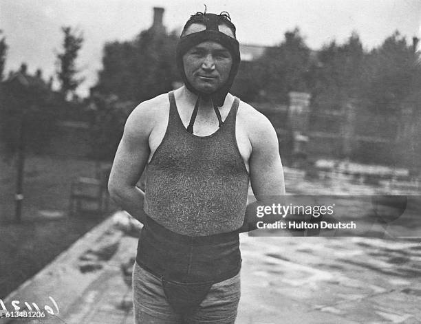 Tom Gibbons In Training. Tom Gibbons, the American boxer who meets Jack Bloomfield at the Wembley Stadium, is now busy training at the Country Club,...