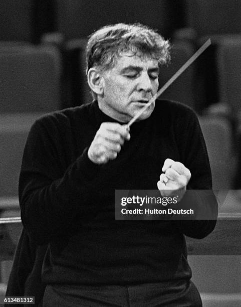 American conductor, composer and pianist Leonard Bernstein deep in concentration during a concert, December 8, 1966.