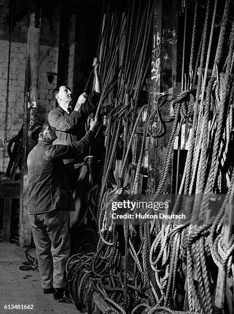 Man Making Rope 917 Two Men Pulling A Rope Stock Photos, High-Res Pictures, and Images ...