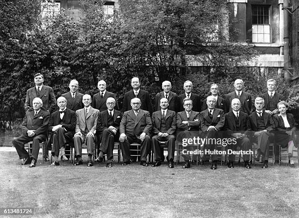 Prime Minister and Labour Party leader, Clement Attlee , in the garden of No 10 Downing Street, with his new cabinet, London, August 1945. Front row,...