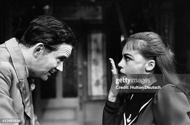 Leslie Caron and Tony Britton in a scene from the London production of Gigi, based on the novel by Colette, which was also made into a successful...