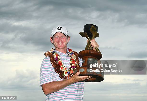 Brandt Snedeker of the USA poses with his trophy after winning on day four of the 2016 Fiji International at Natadola Bay Golf Course on October 9,...