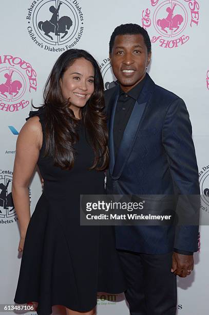 Actress Nicole Pantenburg and record producer Kenny "Babyface" Edmonds attend the 2016 Carousel Of Hope Ball at The Beverly Hilton Hotel on October...