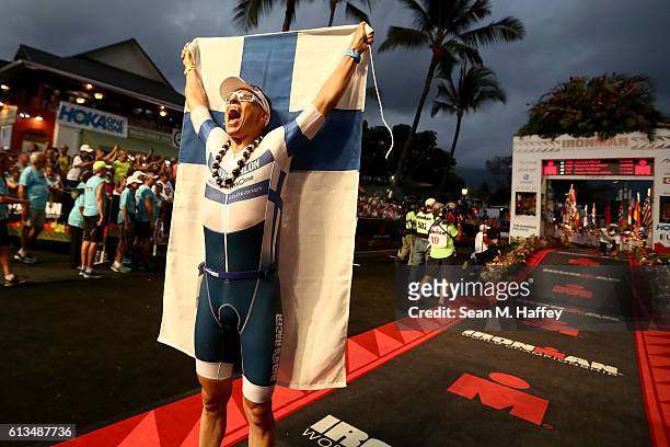Alexander Stubb of Finland reacts to finishing the 2016 IRONMAN World Championship triathlon on October 8, 2016 in Kailua Kona, Hawaii.