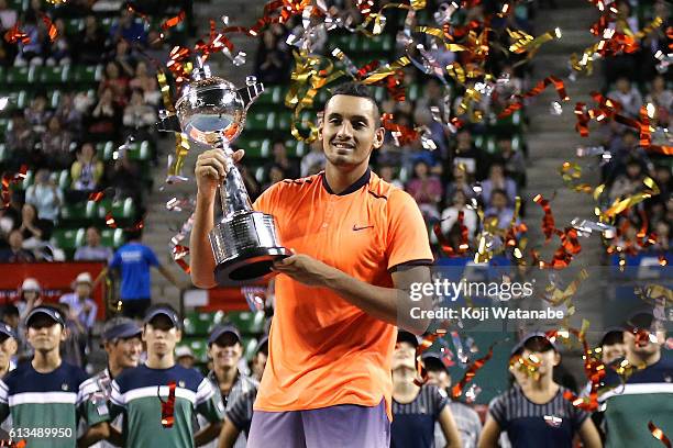 Nick Kyrgios of Australia poses with the trophy after winning the men's singles final match against David Goffin of Belgium on day seven of Rakuten...