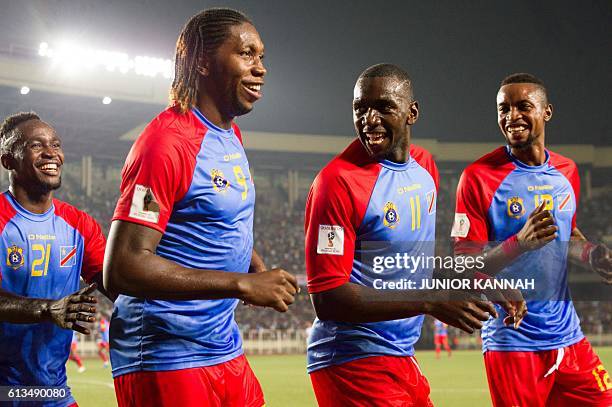 S Botuli Padou Bompunga, Dieumerci Mbokani, Bolasie Yala and Jonathan Bolingi celebrate during the FIFA World Cup qualifier between the Democratic...