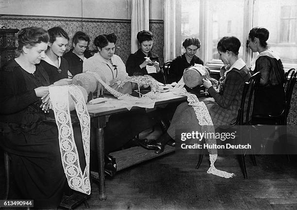 Students at a Berlin lace school.