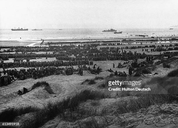British & French troops waiting on the dunes at Dunkirk during the Dunkirk evacuation, 26th May-4th June 1940.