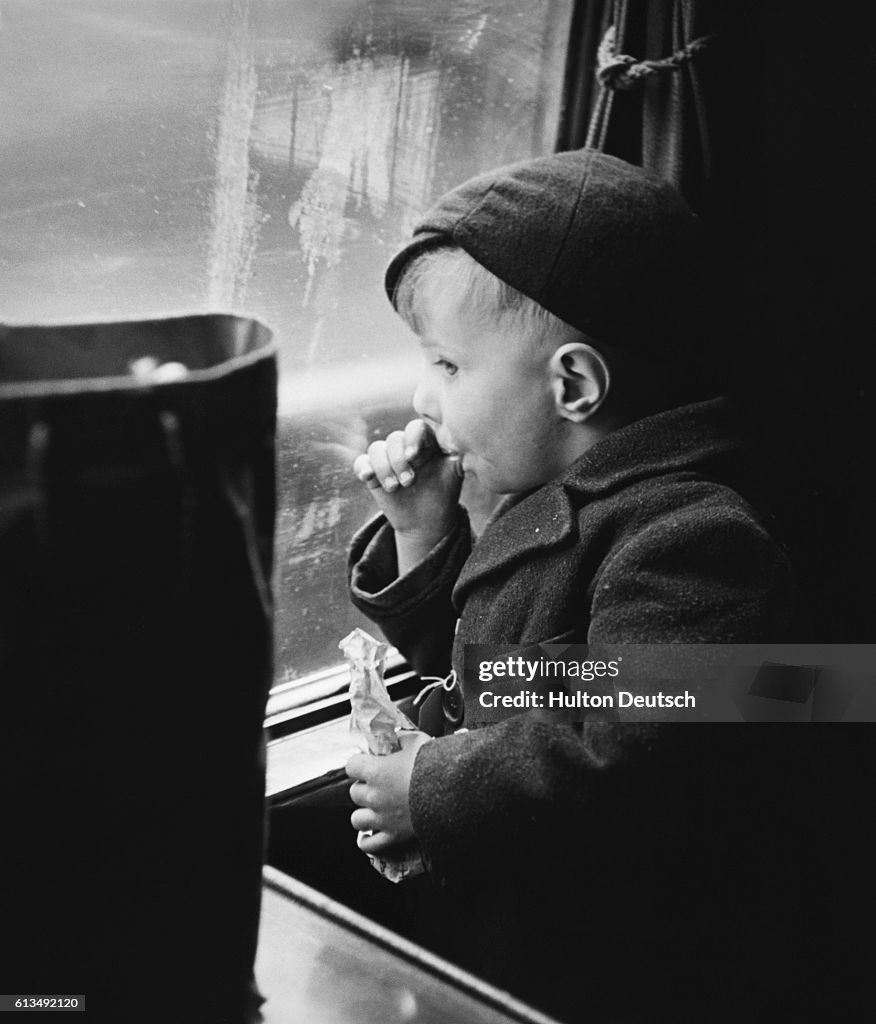 Young Evacuee on Train