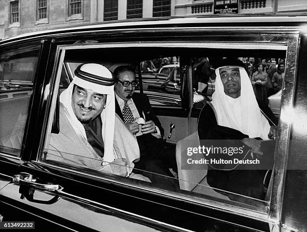 Prince Faisal is served with coffee, while visiting the RAF Station in Northolt. | Location: Claridges, London, England, UK.