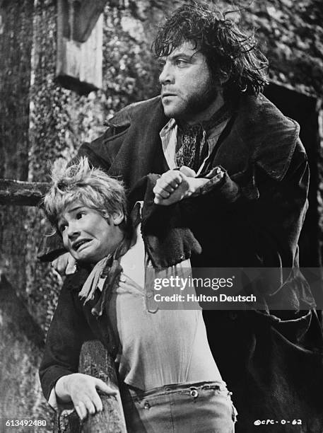 Mark Lester as Oliver Twist and Oliver Reed as Bill Sykes in the film Oliver!, ca. 1968.
