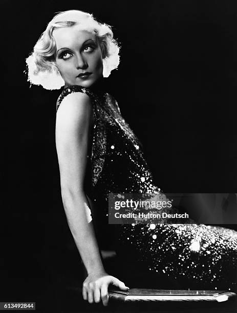 Glamorous Carole Lombard, pictured while she was making the movie Sinners in the Sun. Lombard was married to William Powell and later to Clark Gable;...