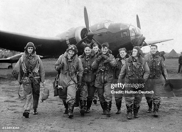 Bomber crews of No 83 Squadron in front of a Handley Page Hampden bomber at RAF Scampton, Lincolnshire, October 1940.