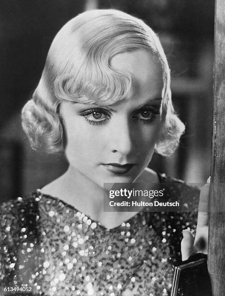 Glamorous American actress Carole Lombard in about 1935, the year she obtained a divorce from her first husband, actor William Powell. She married...