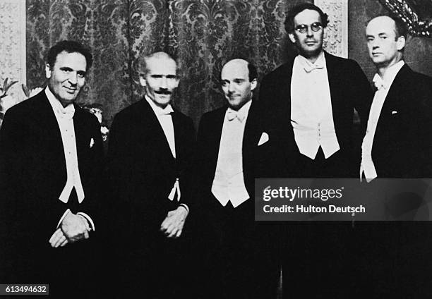Conductors Bruno Walter, Arturo Toscanini, Erick Kleiber, Otto Klemperer and Wilhelm Furtwangler attend a reception for Toscanini. Berlin, ca. 1929.