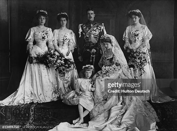 The wedding group for the marriage of Crown Prince Gustav VI of Sweden and Princess Margaret pose together in 1905. Standing, left to right: Princess...