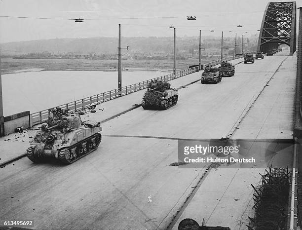 Guards Tanks Streaming Across Nigmegen Bridge After Its Capture.