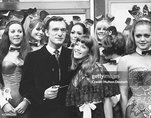 Hugh Hefner and his girlfriend Barbi Benton visit his Playboy Club in London.