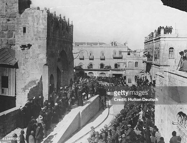 Messages are read to the British forces in Jersualem, 1917. The British army, led by General Edmund 'The Bull' Allenby, captured the city from...