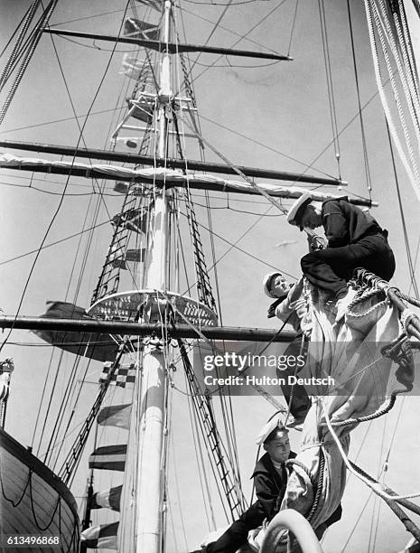 The famous old China tea clipper Cutty Sark, built at Dumbarton in 1869, will sail up the Thames at the end of this week after an absence of 25...