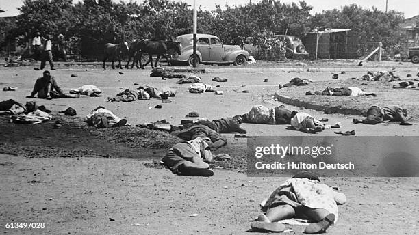 More than fifty native South Africans lie dead after police opened fire on a demonstration in Sharpeville. The people were protesting against the...