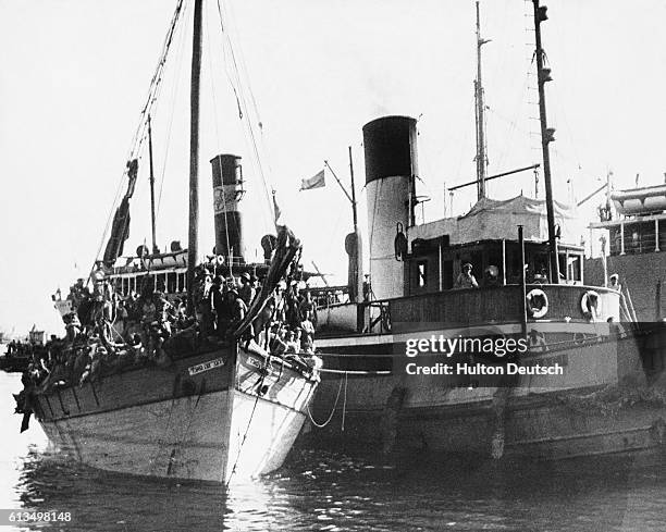 Illegal Jewish immigrants from Europe are stopped in the Bay of Haifa before they can enter Palestine. They will be trans-shipped to Cyprus, where...