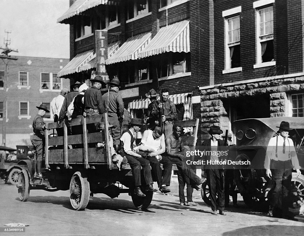 Wounded Prisoners in Trucks in Oklahoma, 1921