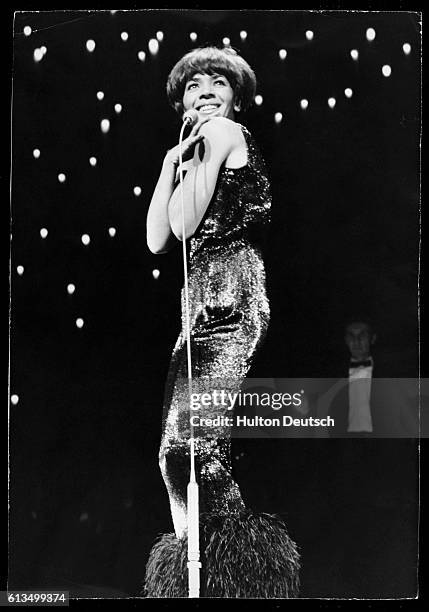 Shirley Bassey At The London Palladium, 1965. "Shirley Bassey at the Palladium today in the dress she will wear before the Queen at tonight's...