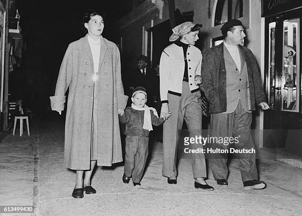 Swedish actress Ingrid Bergman with husband, Italian film director Roberto Rossellini and son Robertino, walking in Capri, Italy in 1953.