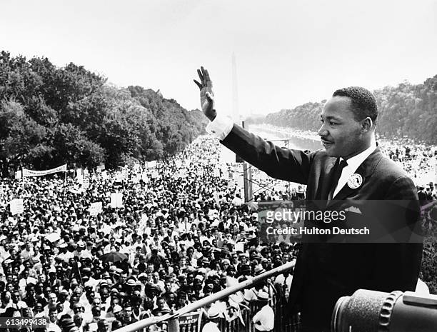 Reverend Martin Luther King, Jr. Waves to participants in the Civil Rights Movement's March on Washington from the Lincoln Memorial. It was from this...