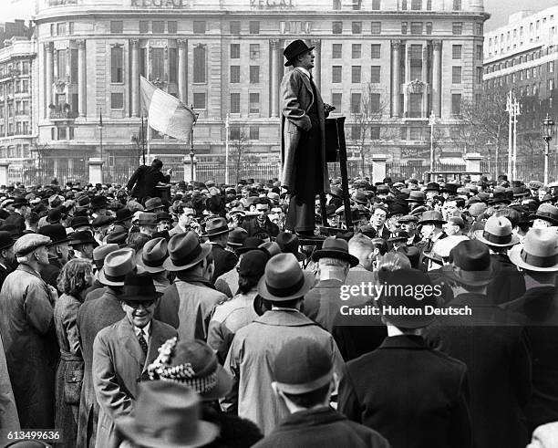 Speaker at London's Hyde Park corner, a traditional area for public debate, succeeds in drawing a crowd.