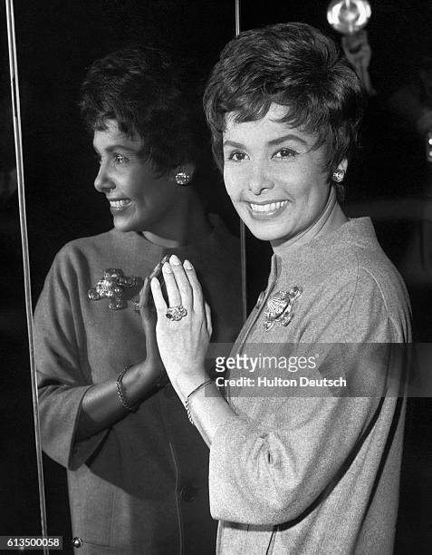 Lena Horne arrives here for cabaret engagement at the "Talk of the Town". American singer-actress Lena Horne at a reception at the London Hippodrome,...