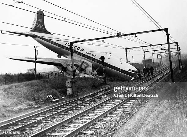 Seventy-one holiday makers had an amazing escape yesterday when their Hermes airliner crashed as it was landing in heavy rain at Southend. The huge...