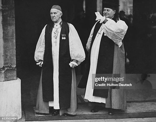 Cosmo Gordon Lang, left, the Archbishop of Canterbury and the Archbishop of York leaving St. James Palace together.